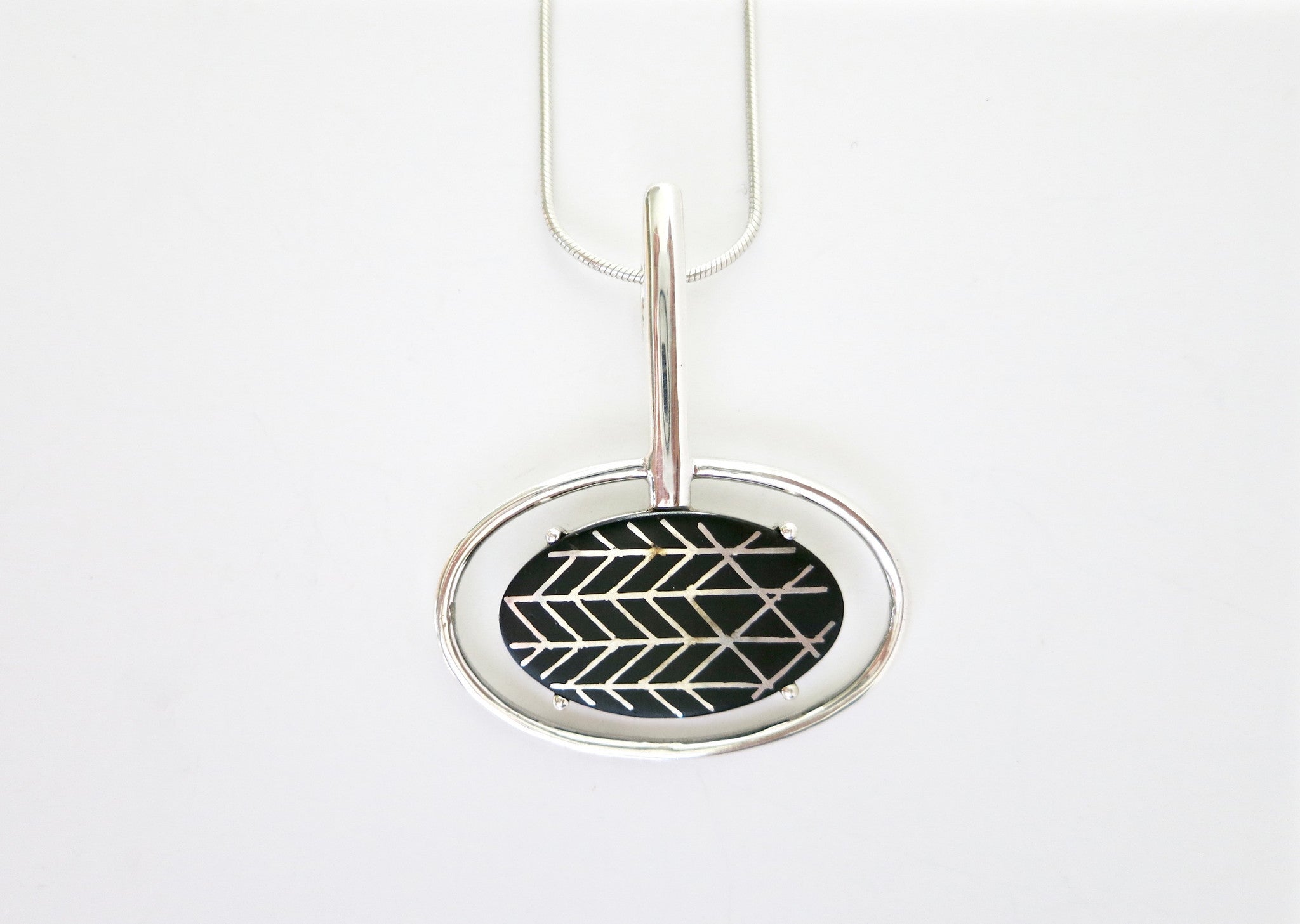 Contemporary, sophisticated oval Bidri pendant (PB-9184-P)  Necklace, Pendant Sterling silver handcrafted jewellery. 925 pure silver jewellery. Handmade in India, fair trade, artisan jewellery. Lai