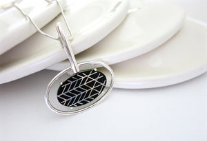 Contemporary, sophisticated oval Bidri pendant - Lai